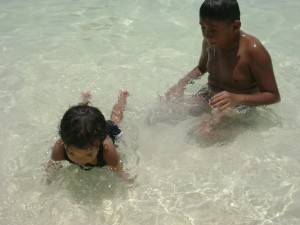 Aki swimming with his cousin, Boodie in Shangrila Mactan