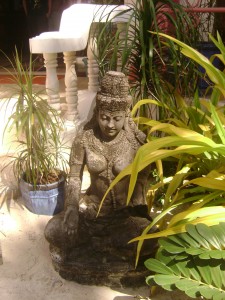 Balinese sculptures in their garden